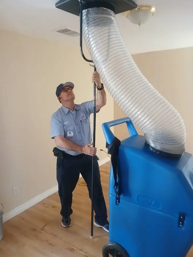 HVAC Installation technician using HEPA equipment in Garner
